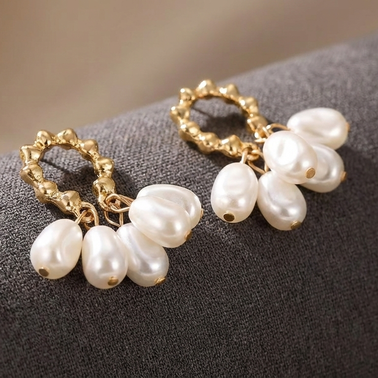 Pearl earrings with gold hooks